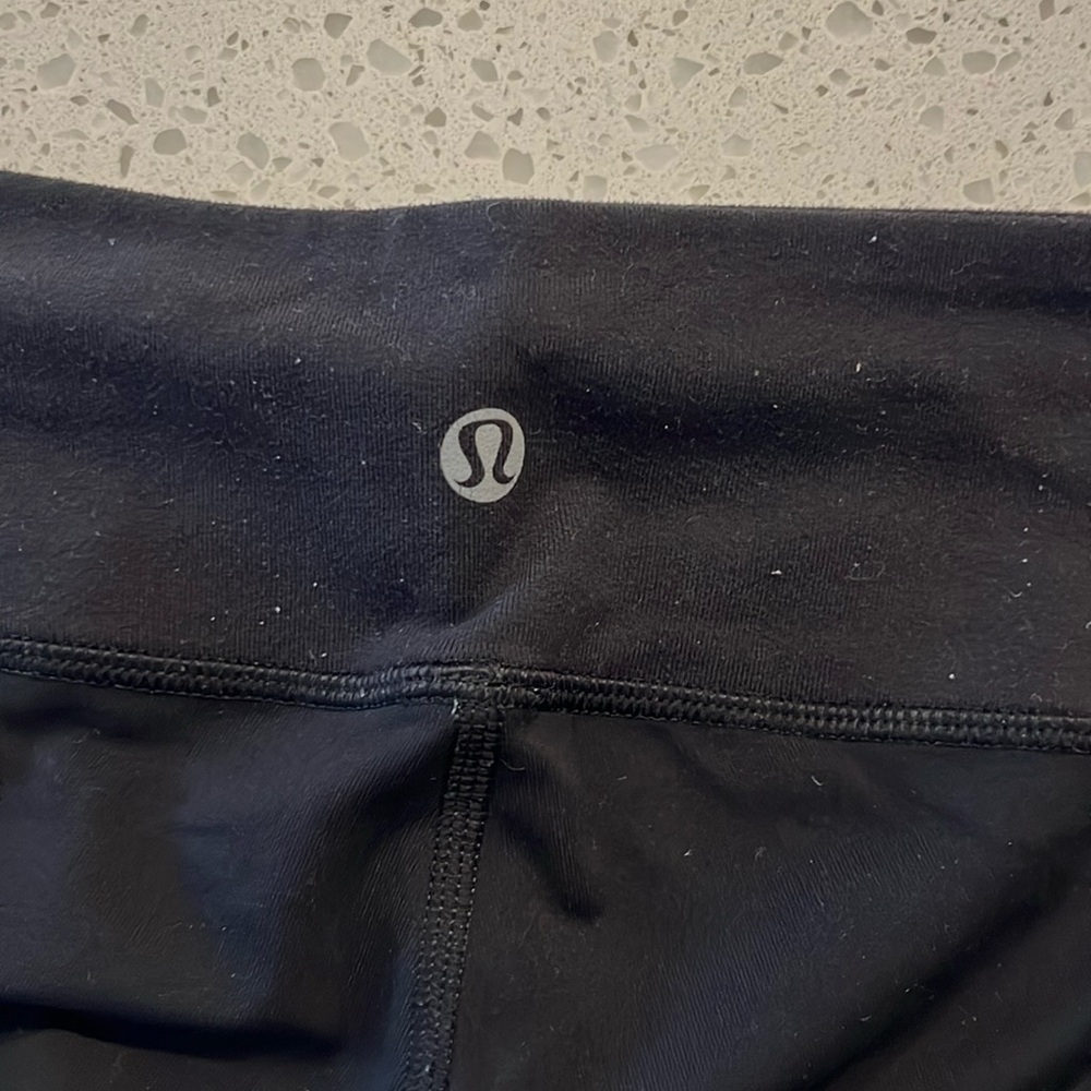 Lululemon Black Crop Leggings with Mesh on back leg